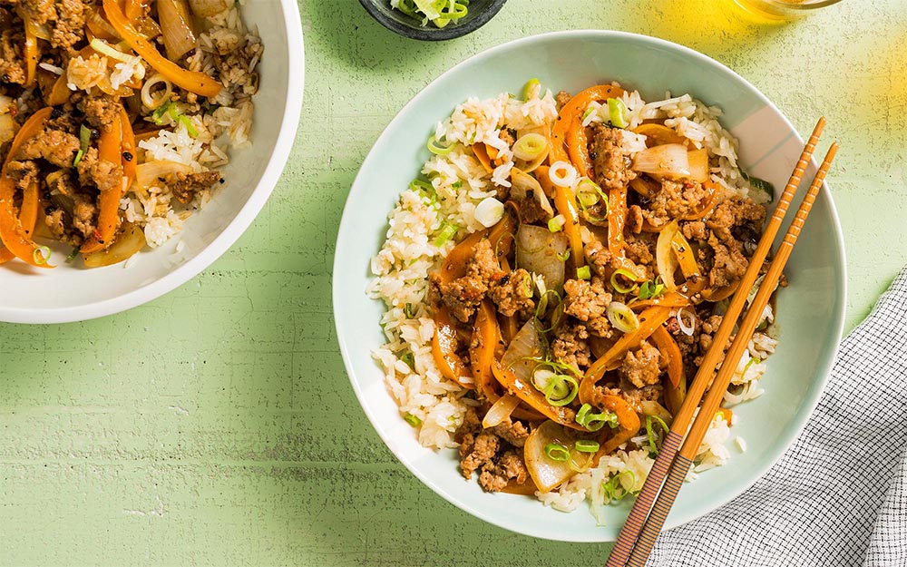 Pork Moo Pad Prik Thai Dam with green onion rice,